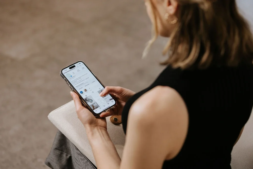 close up of a phone in a woman's hands