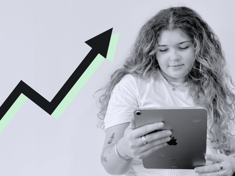 Curly haired woman using chatgpt on her ipad